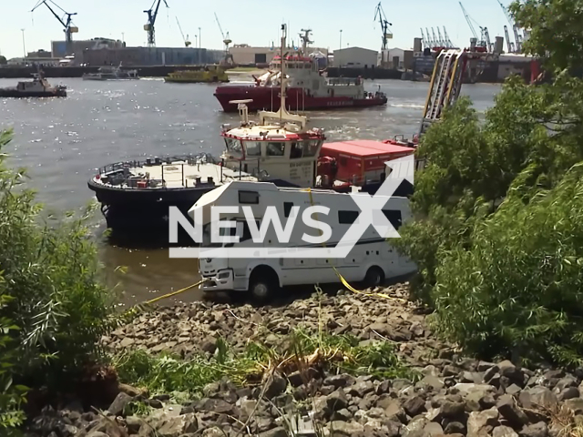 Image shows the campervan, undated photo. It rolled in the Elbe River, in St Pauli, Hamburg, Germany. Note: Photo is a screenshot from a video. (Newsflash)