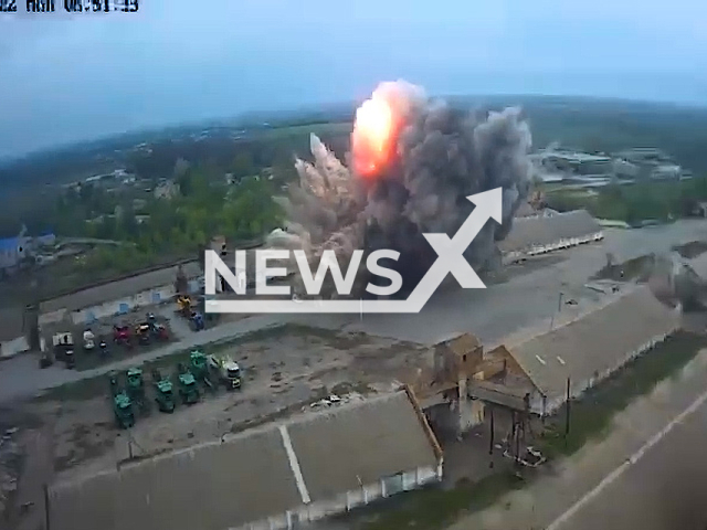 The destruction of a grain warehouse by the Russian missile in the Sinelnykivsky district in the Dnepropetrovsk region in Ukraine on the 2nd of May 2022.
Note: This picture is a screenshot from the video. (@Valentyn.Reznichenko/Newsflash)