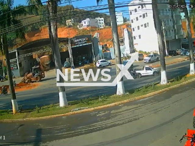 Motorcyclist falls into truck after colliding with vehicle in Manhuacu, Brazil, Monday, July 2024. The motorcyclist suffered only minor injuries.Note: Photo is a screenshot from a video. (Newsflash)