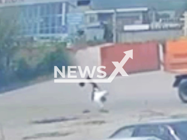 Traffic police officer, 38, receives an unexpected blow to the head from the door of moving truck on the road in Pyatigorsk, Russia on Sunday, July 7, 2024. As a result, the officer was hospitalized with head and chest injuries. Note: Picture is screenshot from a video (Newsflash)