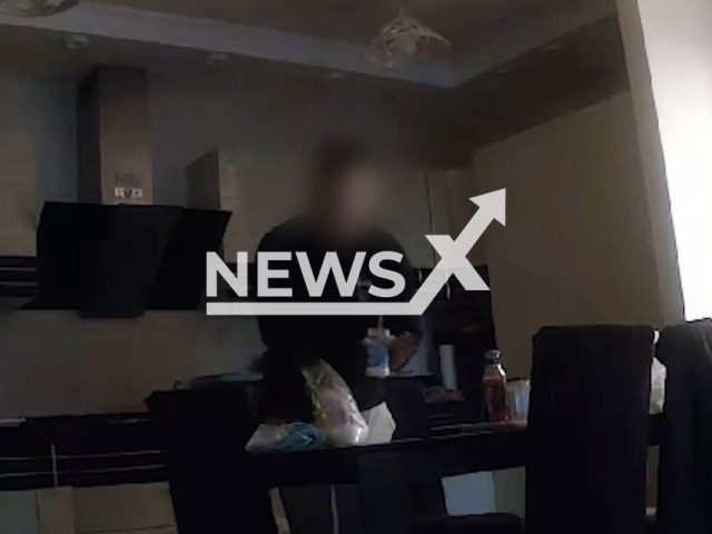 Footage shows Artyom Missyura, 25, adding poison to food for his mother and step father in Balashikha, Moscow Oblast, Russia, undated. Artyom sprinkled poison into their food for six months allegedly because of the desire to get their apartment. Note: Picture is screenshot from a video (@sledcomru/Newsflash)