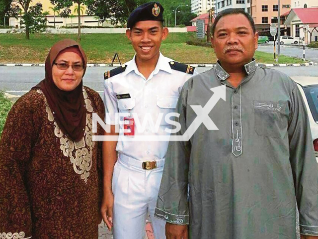 Zulfarhan Osman Zulkarnain poses with his parents in undated photo. He was murdered in Malaysia. Note: Private photo taken from local media. (Newsflash)