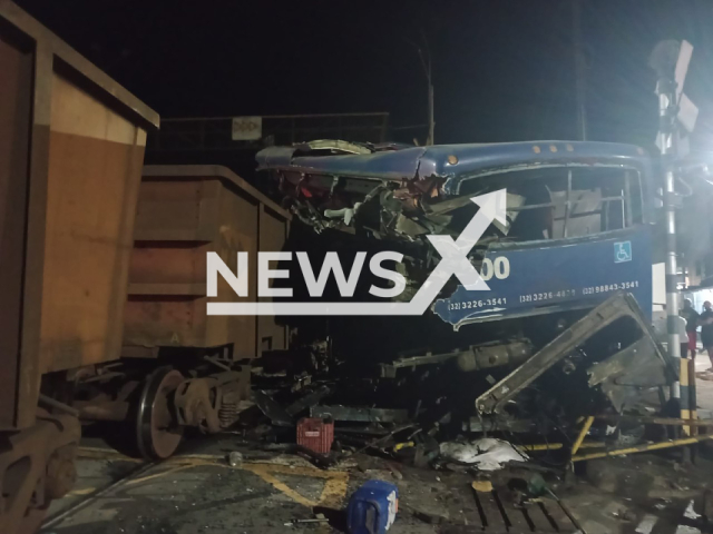 Picture shows the crashed bus in Juiz de Fora, Brazil, undated. A train hit it. Note: Photo from firemen. (@Bombeiros_MG/Newsflash)