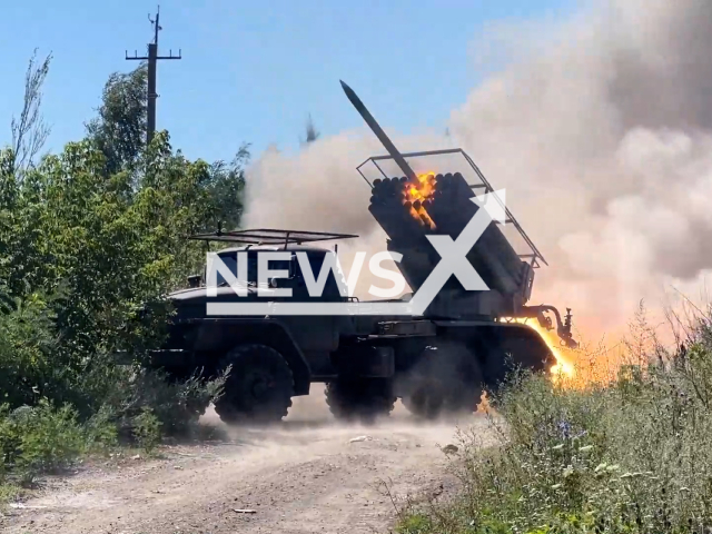 Image shows a Russian BM-21 Grad multiple rocket launcher hitting Ukrainian soldiers and their equipment, undated photo. It took place in Avdiivka, Donetsk Oblast, Ukraine, July 30, 2024. Note: Photo is a screenshot from a video. (Russian Ministry of Defence (MoD)/Newsflash)