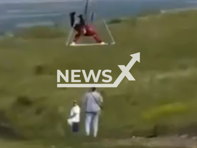 Extreme paraglider accidentally lands on tourist's head at Turataw hill, Republic of Bashkortostan, Russia on Monday, July 29, 2024. The tourist was hospitalized. Note: Photo is screenshot from a video (Newsflash)