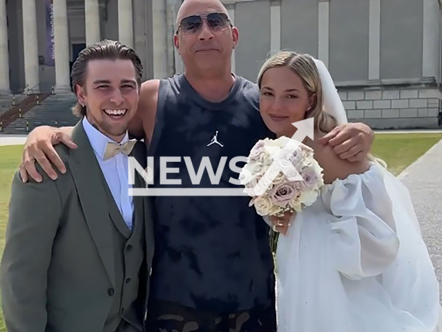 Image shows Vin Diesel, 57, crashing a couple's wedding, undated photo. It took place in Munich, Germany. Note: Photo is a screenshot from a video. (Newsflash)