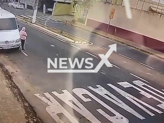 Woman fakes being hit by a car in Alfenas, Brazil, Wednesday, July 31, 2024. The police was not called. Note: Photo is a screenshot from a video. (Newsflash)Woman fakes being hit by a car in Alfenas, Brazil, Wednesday, July 31, 2024. The police was not called. Note: Photo is a screenshot from a video. (Newsflash)