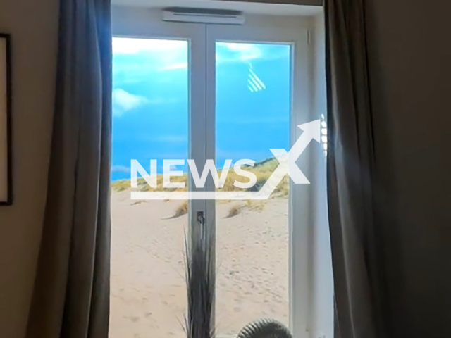 Image shows the fake sea-view room, undated photo. It was booked by influencer Sonja Dennig, 28, in Westerland, Sylt, Germany. Note: Photo is a screenshot from a video. (Newsflash)