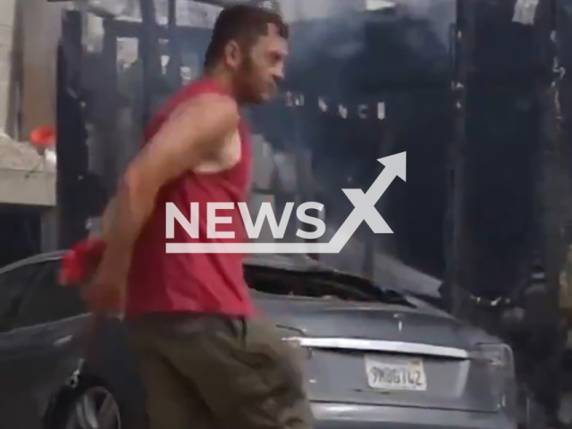 An American tourist set fire to a building after connecting his Tesla vehicle directly to a light pole to recharge it. The incident happened in Tijuana, on the Pacific Coast of Mexico, on 5th August 2024.  Note: Photo is a screen from video (Newsflash)