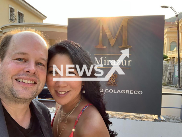 Matthias Ruhl, 50, and his wife pose in undated photo. He has visited all three-michelin star restaurants in the world. Note: Private photo from social media. (@travelsforstars/Newsflash)