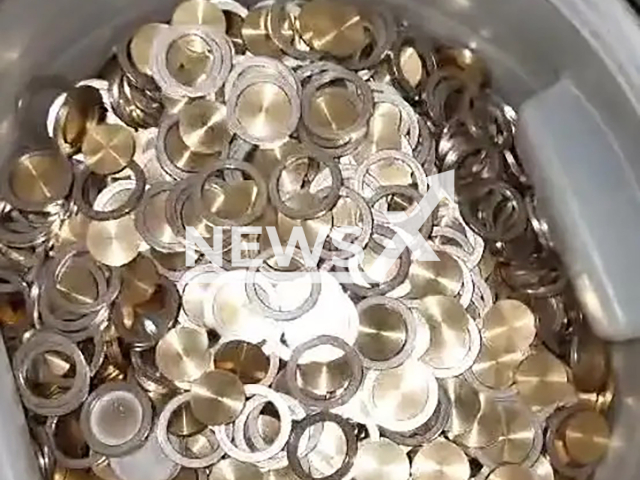 Picture shows the seized coins, undated. A 34-year-old forger who allegedly produced hundreds of thousands of EUR 2 coins over the last two years was arrested in Pristina, Kosovo. Note: Europol photo. (Europol/Newsflash)