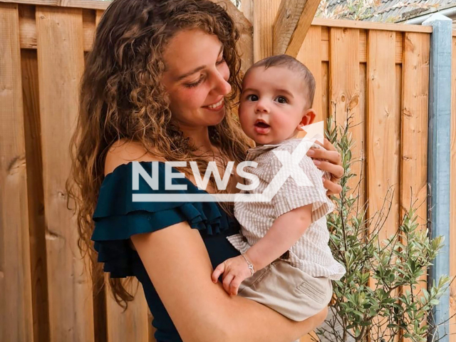 Edi Hoefnagel-Visser, 23, and her child, pose in undated photo. She fears for the life of her husband Mark Hoefnagel, 26, following the hotel collapse in Kroev, Rhineland-Palatinate State, Germany, August 6, 2024. Note: Private photo from social media. (@edihoefnagel/Newsflash)