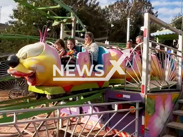 Woman falls from children's roller coaster at amusement park in Alem Paraiba, Brazil, Sunday, Aug. 11, 2024. She was injured. Note: Photo is screenshot from a video (Newsflash)