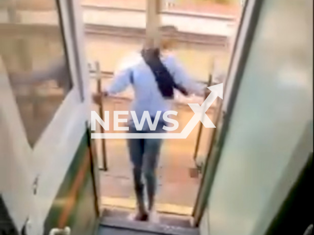 Malaysian woman hits pole while leaning out of a moving train in Thailand, Aug. 5, 2024. She suffered minor injuries. Note: Photo is screenshot from a video. (@pr.railway/Newsflash)