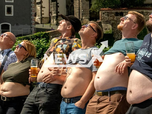 Image shows customers posing for the calendar, undated photo. Innkeeper Alexander Klaus, 42, from Goerlitz, Saxony State, Germany, made a beer belly calendar. Note: Private photo. (Newsflash)