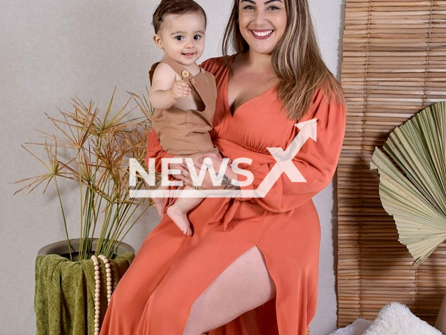 Nayara Fonseca poses with child in undated photo. She was shot by ex-boyfriend in Boituva, Brazil. Note: Private photo taken from social media. (Newsflash)