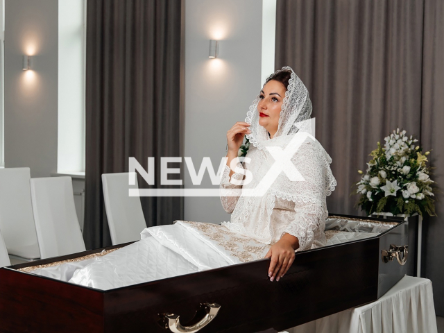 The head of funeral company Evgenia Zlobina shows the process of 'Coffin therapy' in Izhevsk, Russia, undated. They offer alive clients a funeral experience with all rituals as a therapy. Note: Picture is private used in local media. (Evgenia Zlobina/Newsflash)