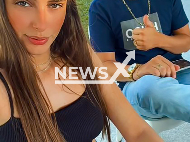 Yasmin Araujo Castro e Silva, 23, poses with husband in undated photo. She was shot dead in front of her four-year-old daughter in Patos de Minas, Brazil. Note: Private photo taken from social media. (Newsflash)