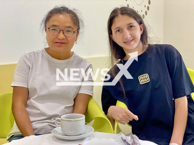 Sumayya Dalatmirova, 16, and her companion Nishangul 'Nicky' Tajibaeva, pose in undated photo. Three weeks have passed since the 20-hour procedure. Note: Licensed content. (SALK, Fuerweger/Newsflash)