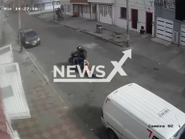 Image shows the 16-year-old girl being dragged along the road, undated photo. The incident happened in Bogota, Colombia, at 2:27pm, Aug. 28, 2024. Note: Photo is a screenshot from a video. (Newsflash)