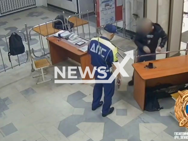 A man, 42, accidently takes out a package of cannabis during entrance checking at police station in Ufa, Bashkortostan, Russia on Tuesday, Sep. 3, 2024. The man tried to escape but was detained.
Note: Picture is screenshot from a video (@V_Sevastyanov/Newsflash)