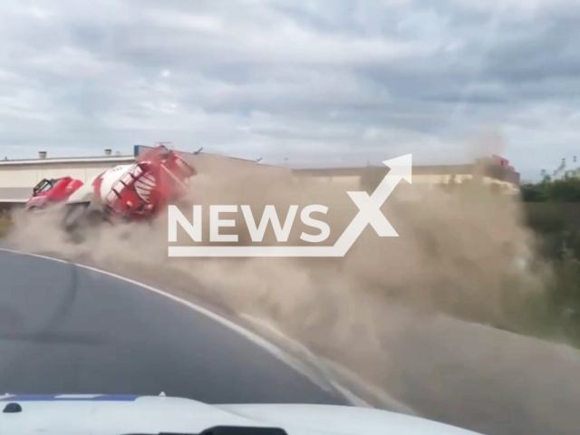 Driver overturns cement mixer into ditch while escaping police in Ishim, Tyumen Oblast, Russia on Wednesday, Sep. 11, 2024. The driver refused to undergo a test for intoxication with alcohol.Note: Photo is a screenshot from a video. (@gibdd72/Newsflash)