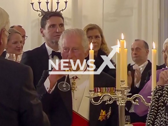 King Charles III drinking wine at a banquet in Berlin, Germany in March, 2023. Famous vineyards in Hochheim am Main which have been supplying Buckingham Palace with wine since 1845 will be dug up to make room for power cables. Note: Photo is a screenshot from a video. (Newsflash)