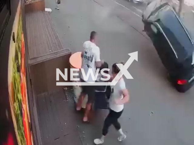 Father rescues his baby boy from uncontrolled car in Galati, Romania, undated. The driver responsible for the accident received a fine. Note: Photo a is screenshot from a video(Newsflash)