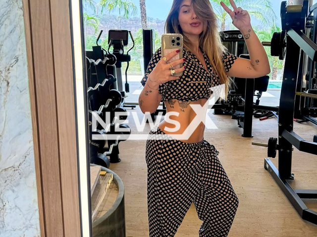 Brazilian influencer Virginia Fonseca Serrao Costa shows off toned stomach in undated photo. She got back in shape just 15 days after giving birth to her third child. Note: Picture is taken from social media. (@virginia/Newsflash)