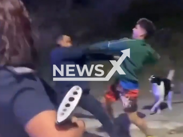 Video shows cop and criminal in a fistfight in San Martin, Buenos Aires in Argentina, undated. The confrontation was filmed by a witness.Note: Photo is a screenshot from a video. (Newsflash)