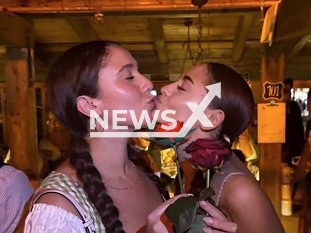 Image shows Leni Klum, 20, kissing a woman, undated photo. It happened at Oktoberfest in Munich, Bavaria State, Germany. Note: Private photo from social media. (@leniklum/Newsflash)