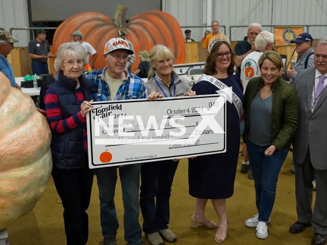 Image shows Steve Connolly in Massachusetts State, USA, undated photo. The man from Sharon, won the 40th annual All New England Giant Pumpkin Weigh-Off. Note: Photo is a screenshot from a video. (Topsfield Fair/Newsflash)