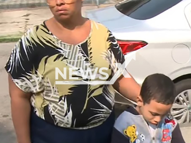 Picture shows the grandmother Claudia Valeria Brito and the boy named only as Enzo, undated. She saved her grandson from being run over in Rio, Brazil. Note: Image is a screenshot from video. (Newsflash)