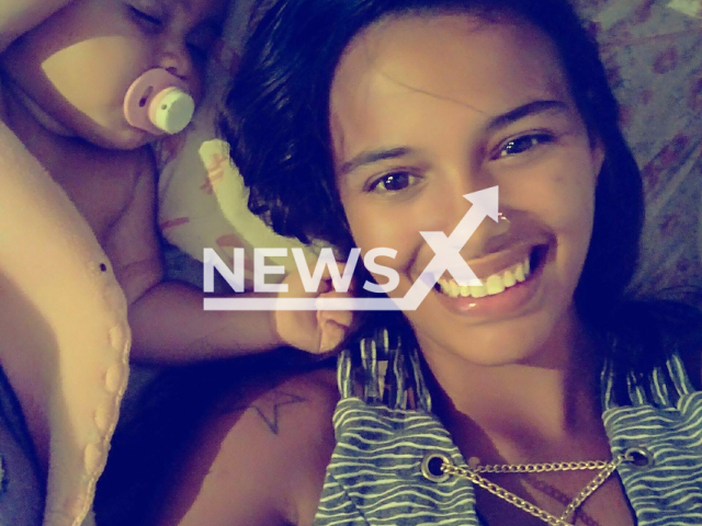 Paula Janaina Ferreira Melo, 25, poses with a child in undated photo. She was killed in Porto Alegre, Brazil. Note: Private photo taken from social media. (NF/newsX)