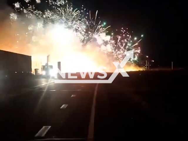 Fireworks burst out in middle of highway after truck crash on the Amur highway near the village of Vozzhayevka, Amur Oblast, Russia on Thursday, Oct. 17, 2024. Four people died in the accident. Note: Photo is a screenshot from a video. (NF/newsX)