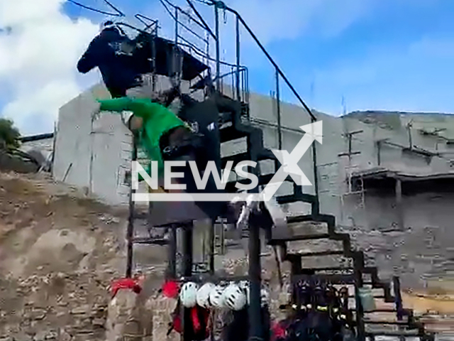 Woman hangs in the air and worker falls on the ground after zipline failure in Real de Catorce, Mexico, undated. Alessia Pina reportedly said that although the workers' reaction was quick, they are not prepared to deal with this type of situation.Note: Photo is a screenshot from a video. (@_alessiapina/NF/newsX)