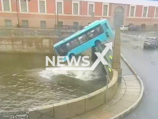 A bus with people plunges off bridge into Moyka River in Saint Petersburg, Russia on Friday, May 10, 2024. As a result of the accident, 7 bus passengers died. Note: Photo is a screenshot from a video. (@spb_police78, NF/newsX)