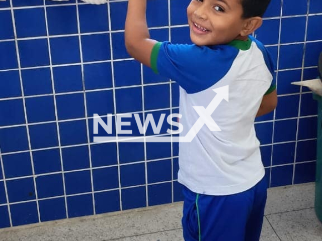 Carlos Eduardo Cabral de Moura, 5, poses in undated photo. He was shot in Japeri, Brazil. Note: Private photo taken from social media. (NF/newsX)