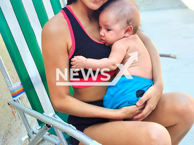 Milena Vitoria Garcia de Barros poses with child in undated photo. She was found dead in Senador Camara, Brazil. Note: Private photo taken from social media. (NF/newsX)