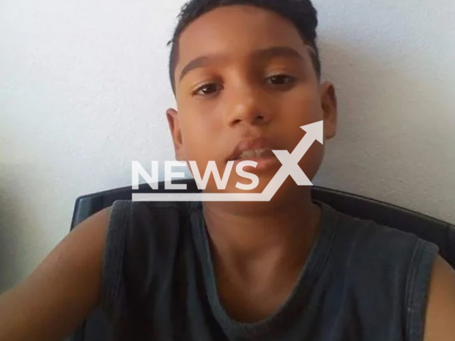 The boy Angelo Valerio, 8, poses in undated photo. He died in Itapemirim, Brazil. Note: Private photo taken from local media. (NF/newsX)