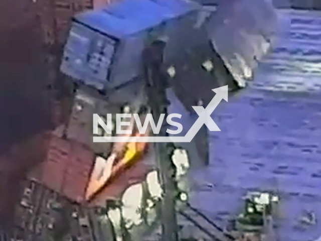 Shipping container falls on forklift injuring man at Pasir Panjang, Singapore, Monday, Nov. 25, 2024. He is in stable condition. Note: Photo is a screenshot from a video. (NF/newsX)