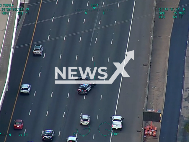 Helicopter footage shows police vehicles performing a PIT maneuver and boxing the suspects' Wilmer Sanchez-Hernandez vehicle in Houston in the United States on 28th October 2024. Note: Photo is a screenshot from a video. (@Houstonpolice/NF/newsX)