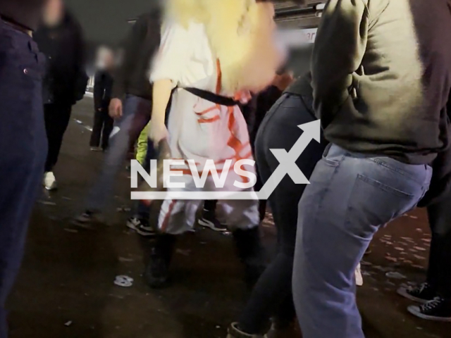 Image shows a man beating a woman with a cow horn, undated photo. It took place at the Klaasohm festival in Borkum, Lower Saxony State, Germany. Note: Photo is a screenshot from a video. (NF/newsX)