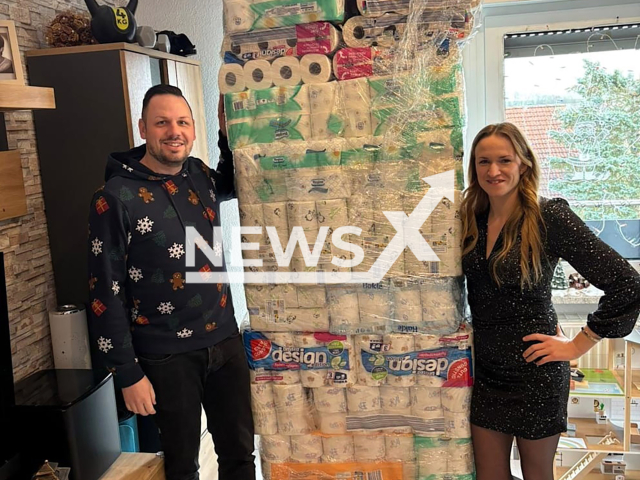 Florian Junker, 34, from Wuerzburg, Bavaria State, Germany, and his wife Sandra, 34, pose in undated photo. He gave her 1,500 toilet roll for Christmas. Note: Private photo from local media. (NF/newsX)