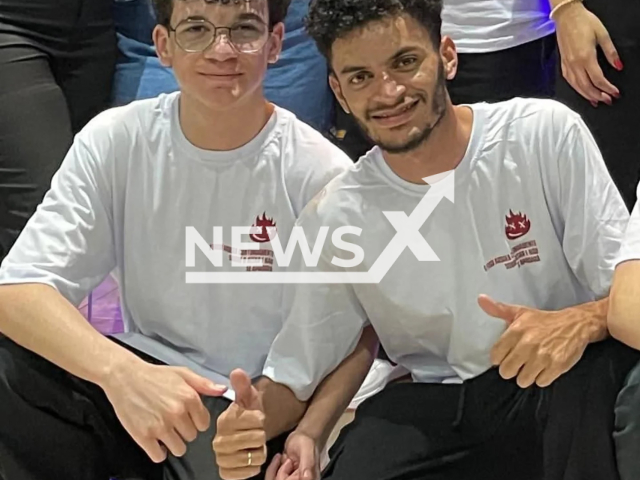 Brothers Felipy (left), 16, and Edley (right), 24, pose in undated photo. They were found dead on the coast of SP, Brazil. Note: Private photo taken from local media. (NF/newsX)