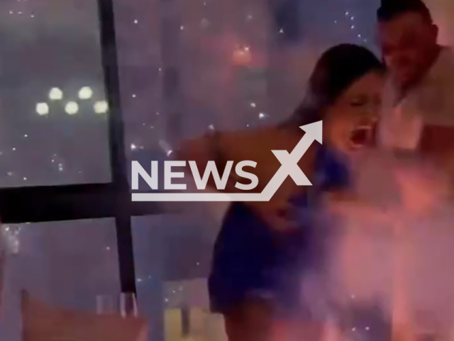 Video shows tourist hit by fireworks in apartment on New Year's Eve in Navegantes, Brazil. She suffered second-degree injuries to her hand , and almost third-degree injuries to her chest. Note: Photo a is screenshot from a video(@bibims_/NF/newsX)