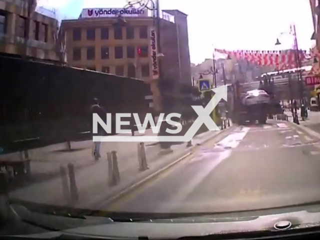 Driver runs after tow truck which took his vehicle in Kagıthane, Turkey, undated. The moments were caught on a dash cam. Note: Photo is a screenshot from a video. (NF/newsX)