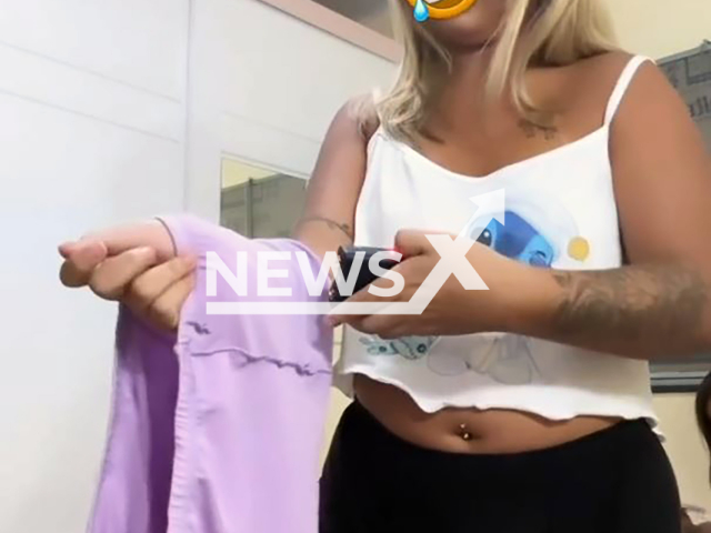 Influencer uses taser on herself in front of a child in Manaus, Brazil, undated. The video was shared on Instagram on Nov. 19, 2024. Note: Photo a is screenshot from a video(@mirellyribeiroofc/Newsflash/NX)