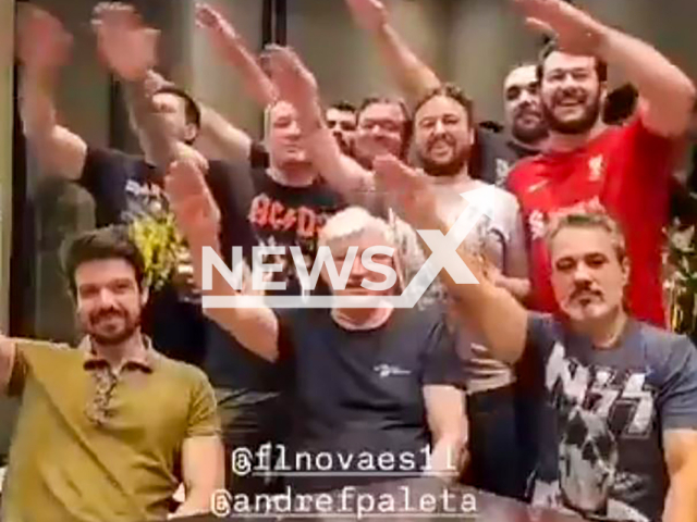 A group of friends reportedly imitate Elon Musk's gesture in Catanduva, Brazil, undated. The police are investigating. Note: Photo a is screenshot from a video(Newsflash/NX)