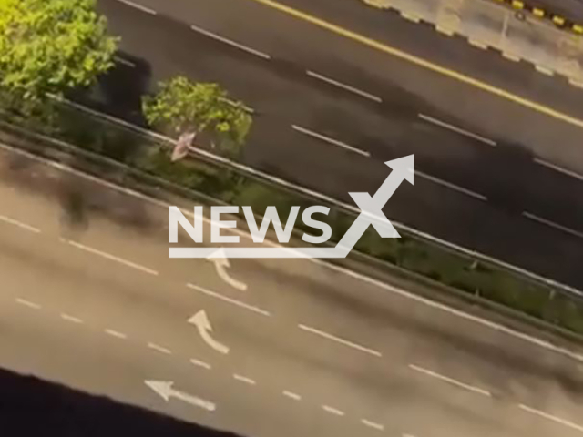 Two cars ram into people outside a nightclub in Kuala Lumpur, Malaysia, undated. At least two people were injured. Note: Photo a is screenshot from a video(Newsflash/NX)